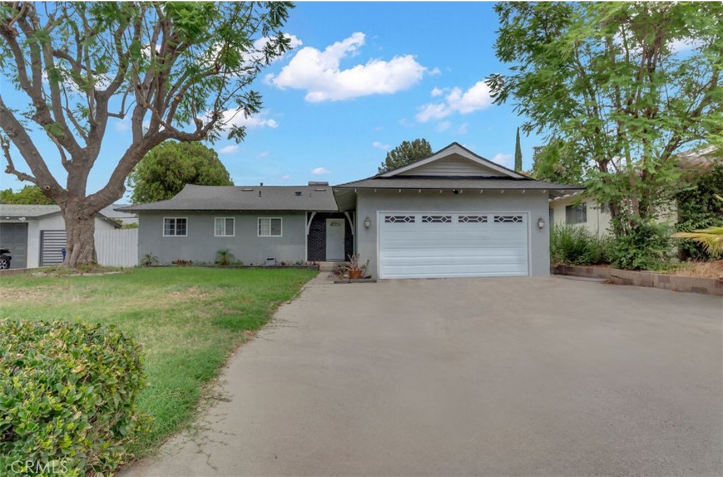 This very well maintained Beautiful Single Story Home located on a tree lined street in the Beautiful City of San Bernardino! This home is located on a quiet tree lined street just a few minutes away from the freeway. This home offers Rich wood like flooring through the home. The family room has a cozy fireplace with an open concept floor plan. The home is very well maintained with a private manicured backyard! The kitchen features rich custom cabinets and granite counter tops. The home has sun room for entertaining and hosting family gatherings and barbeques. The home shows light, bright and inviting! It's a must see to truly appreciate the Pride of Ownership in this Home! It's more in ready!