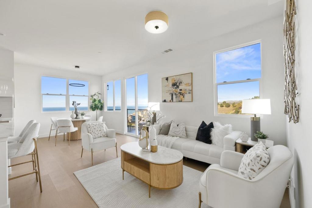 Welcome to Pacifica Heights - Where Luxury meets Serenity! Each residence has been meticulously designed with modern architecture, spacious layouts, and energy-efficient features, ensuring a comfortable and environmentally responsible lifestyle. 801 Fassler: Highlighted by an open kitchen with large island and pantry area. The kitchen opens and flows seamlessly into the great room, providing flexibility to arrange your living and dining areas. An additional powder room on the main level is perfect for guests. Balcony area off of the living / dining area to soak in the majestic views. Luxurious primary bedroom with sliding door to a balcony and en-suite bath with a large walk-in closet. Primary bathroom featuring double vanities, freestanding tub, and separate shower. Additional features include in-unit laundry and attached two car garage. Prepare to be captivated by the awe-inspiring beauty of the Pacific Coastline. Residents at Pacifica Heights are treated to breathtaking ocean and canyon views. You'll wake up to the serenity of the coast and spend evenings on your private patio, savoring the coastal breeze. This is now Pacifica's finest address!