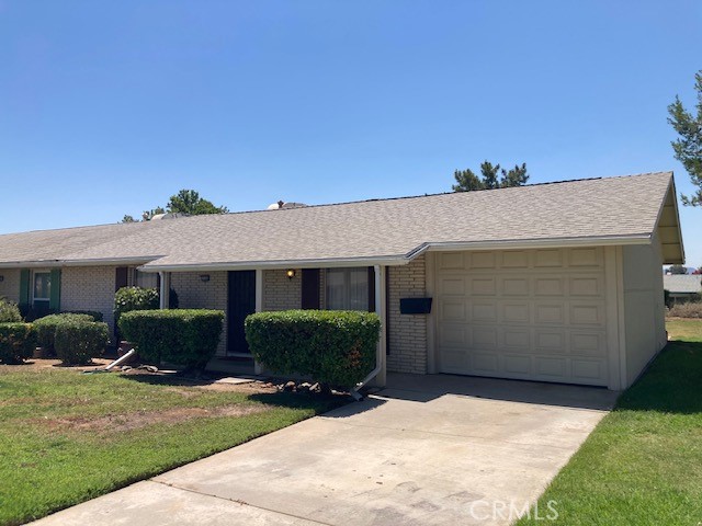 Welcome to this delightful 2-bedroom, 1-bathroom home located in the heart of Sun City. Located in a well-kept 55+ community, this spacious condo offers a bright and open floor plan with tasteful updates throughout. The home features updated flooring, and a refreshed kitchen with Newer stove & New Microwave. 3 Ceiling fans (Living Room and both Bedrooms) and a newer (1 year old) water heater. Additional highlights include a dedicated laundry room and direct access to a one-car garage. A Professionally built 12X8 Storage shed with electricity, installed in the backyard. Roof was replaced within the last 2 years. Sun City Civic Association includes 2 Pools, Spa, Exercise Room, Showers and plenty of opportunities for Active Seniors. This property is ideal for investors or those seeking a peaceful, turnkey residence. Conveniently located just minutes from shopping, dining, and entertainment - everything you need is just a short drive away!