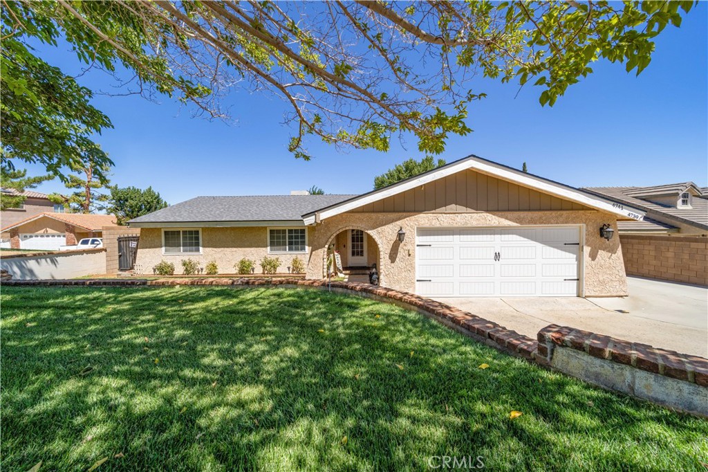 Dual Home Opportunity in the Heart of Quartz Hill! This unique property offers not one, but two beautifully updated homes on a single lot—perfect for extended family living, rental income, or multi-generational lifestyles. *Main House (3 Bed / 2 Bath plus 1.692 sq ft of living space) The main residence is brimming with upgrades, including a brand-new roof, New tankless water heater, new electric panel, new garage door, HVAC system, swamp cooler, and water filtration system. Inside, you'll find wood laminate flooring, Quartz countertops, abundant storage, and a stunning rock-faced fireplace with a pellet stove insert that creates a warm centerpiece in the living room. A spacious covered patio extends nearly the full length of the home, complemented by a charming pergola for outdoor entertaining. *Second house/ADU (2 Bed / 2 Bath plus 1,000 sq ft of living space) The newly built accessory dwelling unit features two bedrooms, two full bathrooms, a modern kitchen with pantry, laundry area, and its own private patio and parking area. With HVAC system and it's brand-new roof and thoughtful design, it's ideal as a guest house or rental. Both homes are securely enclosed by block walls and surrounded by mature trees, offering privacy and tranquility in the desirable Quartz Hill community. Don't miss this rare opportunity to own a versatile property with endless possibilities!