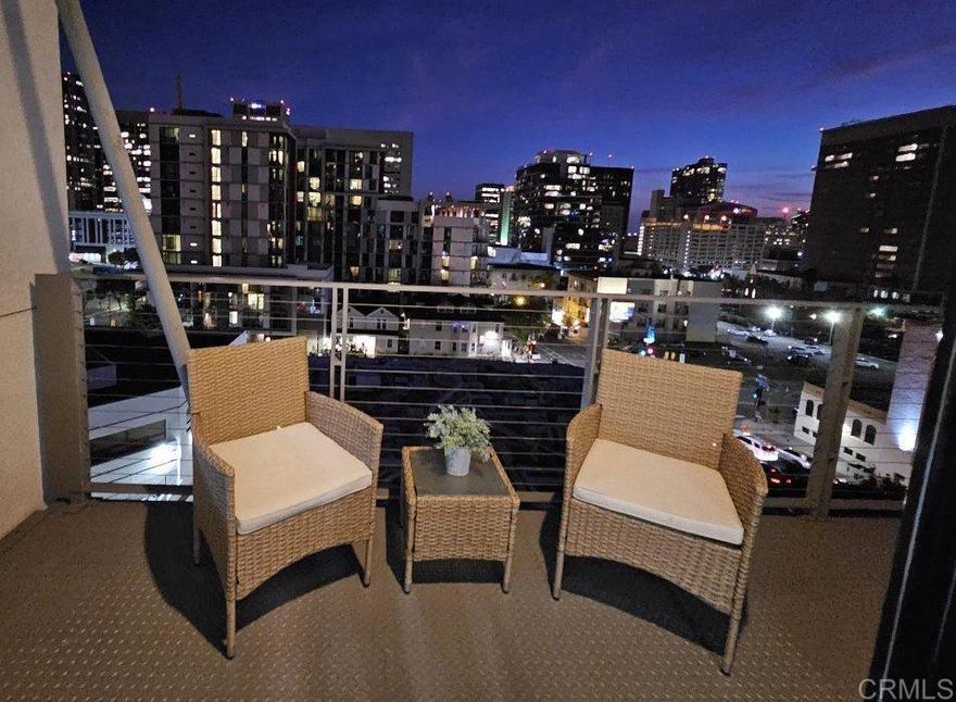 New year, new space! Day or night expansive views overlooking the downtown San Diego skyline with Southwesterly views from this freshly painted turnkey condo at Solara Lofts. This spacious, open-concept layout invites natural light to flood the entire space, highlighting the brand-new LVP flooring that stretches across the living areas. The oversized primary bedroom offers tons of space and a large closet. The bathroom has been updated with a newly resurfaced shower tub, elevating the space with a fresh, contemporary feel, and plenty of storage. The seamless flow from the living, dining, and kitchen areas creates the ideal space for both entertaining and relaxing. Step out onto your private south-facing balcony to take in the vibrant city views, whether it's sipping coffee in the morning or catching the sunset over the skyline. Second bedroom makes for an amazing work from home space, nursery or guest space. Convenience is key with new full-size in-unit washer and dryer, and two dedicated parking spaces. Plus, there's guest parking and a storage locker for your extra belongings. Enjoy all the perks of city living with a wine bar on the first floor, and a short walk to the lively neighborhood of Little Italy. Solara Lofts offers on-site management, a fitness center, saunas, bike storage, pool table, massage room, and a racquetball court.