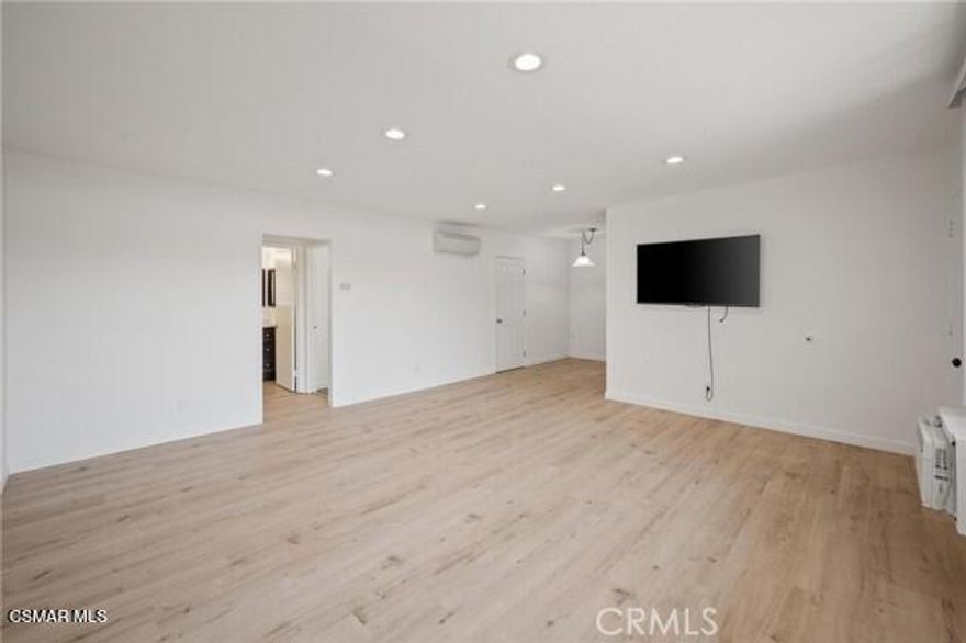 Panorama City Gem with Low HOA! Move-In Ready 1-Bed, 2-Bath Condo.Discover your perfect home at 8800 Cedros Ave, Unit 204! This bright and inviting 1-bedroom, 2-bathroom condo is a fantastic opportunity in a highly convenient Panorama City location. Step inside to find a well-maintained interior featuring elegant hardwood floors and a living room illuminated by modern recessed lighting. Climate control is effortless and efficient year-round with a newer mini-split system. The kitchen is practical and updated with a newer dishwasher. The low HOA dues make this an incredibly affordable ownership opportunity. Step outside your door and enjoy unparalleled convenience, with a park featuring baseball and tennis just one block away. World-class shopping, dining, and groceries at the Panorama City Mall and Walmart are all within at a stone's throw. Perfect for first-time buyers or investors seeking a turn-key property. Don't let this one get away!