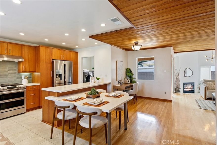 Welcome to your new retreat in North Torrance! Situated on a quiet street in a great neighborhood of well-kept, single-family residences, you’re surrounded by a community that takes great pride in ownership. This beautifully upgraded home features 3 bedrooms and 2 bathrooms including an extended master suite with an attached full bathroom and dual walk-in closets. The tastefully remodeled kitchen is open to the living areas and features sleek cabinetry, new tile backsplash, quartz countertops and stainless steel appliances. Enjoy practical enhancements such as refinished original hardwood floors, cedar plank ceilings, new windows and sliding door, upgraded electrical, a dedicated laundry room and a cozy den with a fireplace and vaulted ceilings.  Conveniently located within close proximity to Columbia Park, North High, Magruder Middle School and Edison Elementary (less than a 5 minute walk!).  Don't miss out on this incredible opportunity to make this picture-perfect house your new home!