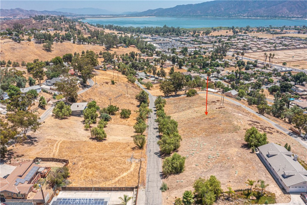 Two adjacent lots are available for sale at $45000 for both BEING SOLD TOGETHER, APN# 378-223-050 (2,614 sq ft) and APN# 378-223-051 (3,049 sq ft) are located on a paved street in the vibrant city of Lake Elsinore, specifically in the Country Club Heights area. These side-by-side lots offer a
prime development opportunity, conveniently located near shopping centers, schools, and the 15 freeway for easy access to amenities. Please note, the seller does not have plans, permits, or reports for these properties. Buyers and their agents are strongly encouraged to conduct their own due diligence to verify property boundaries, utility access, easements, and development requirements with the City of Lake Elsinore Planning Department and the Elsinore Valley Municipal Water District (EVMWD). All information is believed to be reliable but is not guaranteed by the seller or their agents. For more details, please contact the listing agent directly.