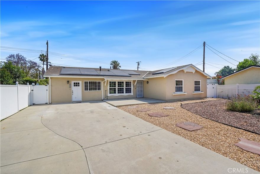 Welcome to this beautifully remodeled, modern single-story home in the highly sought-after Chatsworth neighborhood. This inviting 3-bedroom, 2-bathroom residence offers 1,348 square feet of thoughtfully designed living space.

As you arrive, a long driveway provides ample parking for multiple vehicles. Step inside to a bright and spacious living room and dining area, highlighted by sleek tile flooring and a stylish, modern wood-burning fireplace. The updated kitchen is a true centerpiece, featuring brand-new quartz countertops and stainless steel appliances including a gas range, microwave, dishwasher, and refrigerator. Washer and dryer hookups are conveniently located in the hallway laundry area. All appliances are included, providing move-in-ready convenience.

All bedrooms offer elegant laminate wood flooring, and recessed lighting throughout adds a warm, modern ambiance.
Outside, the expansive backyard provides a peaceful and private retreat perfect for relaxing or entertaining beneath the covered porch. Additional ample storage space adds to the home's functionality.

An ADU (Accessory Dwelling Unit) is located on the property and is currently occupied; however, it remains fully separate from the main home. The backyard is completely divided, and only one front parking space is shared with a respectful tenant.

All appliances and all utilities are included, offering exceptional convenience and value.

Don’t miss the opportunity to make this stunning home your own!