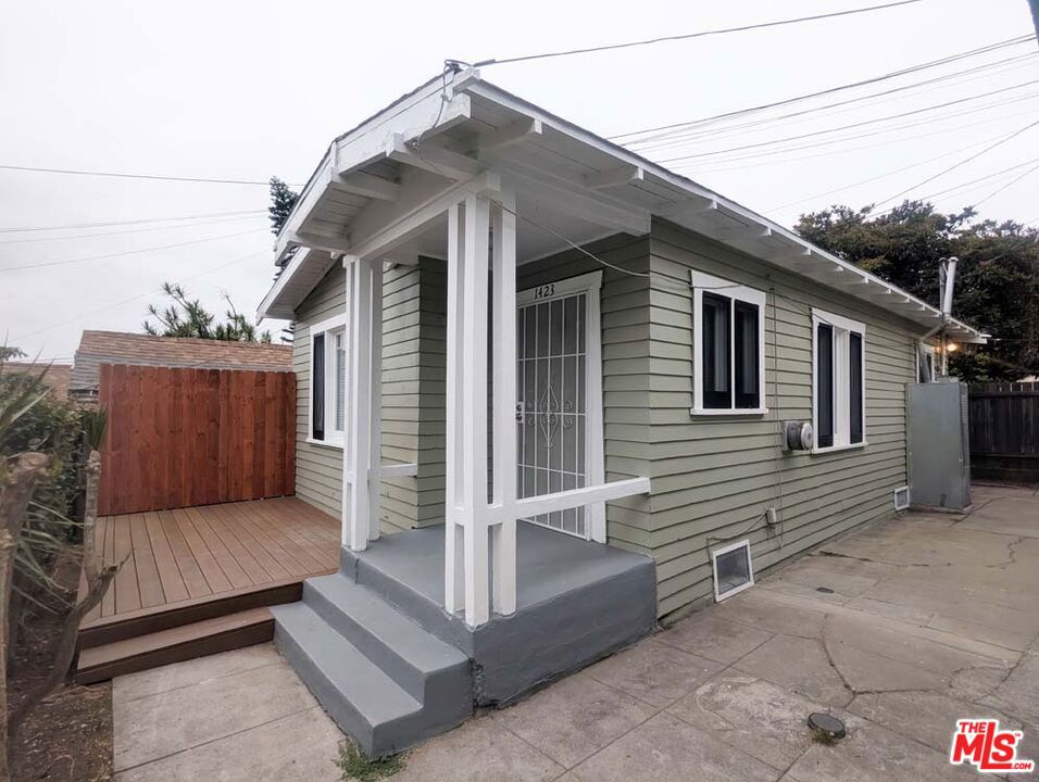 Discover the perfect blend of timeless charm and modern convenience in this newly rehabbed 1-bedroom 1-bath, single-story detached apartment located in historic Angelino Heights, Los Angeles' oldest historic preservation zone, known for its rich concentration of Victorian and Colonial Revival architecture. This bright and airy unit welcomes you with an open-concept living and dining area, brand new luxury vinyl plank flooring throughout, and a decorative fireplace that adds a touch of character. The living and dining area also features ceiling fans to keep the space cool and comfortable. Bathroom comes with a full-sized tub and shower combo. Kitchen is equipped with brand-new gas range, and leads to separate laundry area with brand new washer & dryer, and backdoor access. Private deck in the front, ideal for relaxing, and enjoying the quietness of the area. Major upgrades done to the property, include but not limited to, electrical wiring, plumbing, gas lines, exterior repairs and fresh new exterior paint.