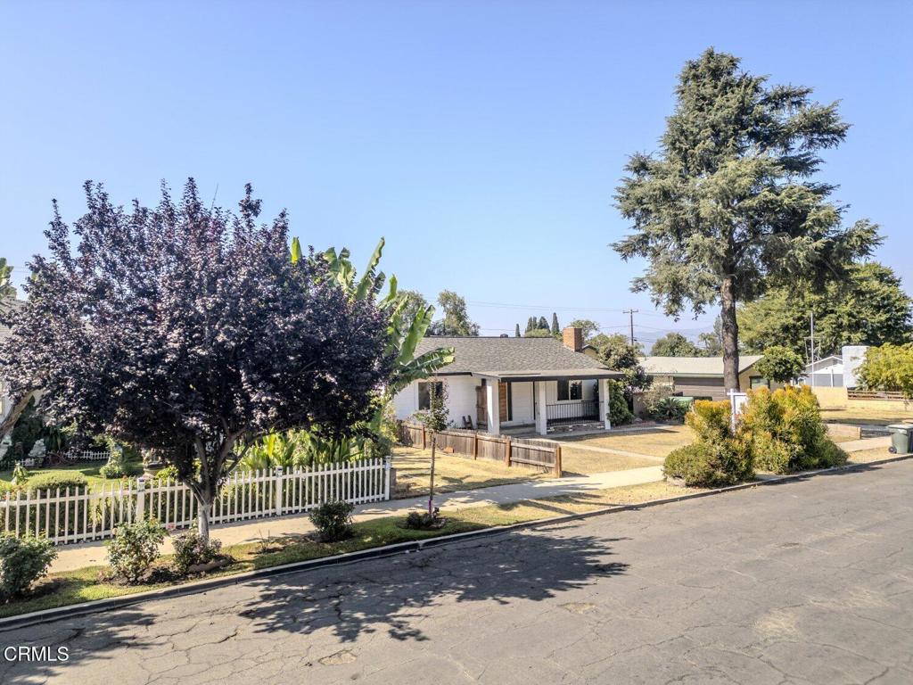 Extraordinary Property in Desirable East Fillmore! Welcome to 412 Blaine Avenue, a remarkable property with endless potential. Situated on a generous 0.25-acre lot in the sought-after East Fillmore neighborhood, this home offers space, charm, and versatility.The main house features two bedrooms and two bathrooms across 1,890 square feet of comfortable living space. The kitchen flows seamlessly into the living room, perfect for entertaining, while natural light fills the home throughout. On cooler days, enjoy the rustic charm of the wood-burning fireplace or the comfort of forced-air heat. When summer arrives, relax and refresh in your private in-ground pool.A detached garage with its own bathroom and sink offers exciting possibilities--convert it into a guest house, multigenerational living quarters, or a rental unit. The property also boasts a strong rental history, giving you the option to live in the main home while generating income from additional space.Conveniently located near Fillmore High School and San Cayetano Elementary, this property blends small-town living with accessibility. Experience the agricultural beauty and peaceful charm of Fillmore while remaining just a short drive to the beaches of Ventura County.Whether you're looking for a primary residence with income potential or a multi-use investment, 412 Blaine Avenue is a rare opportunity you won't want to miss.