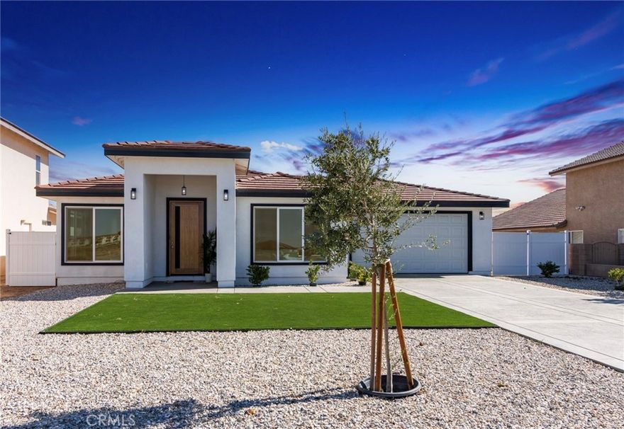 From the moment you arrive, the fully landscaped front yard sets the tone with clean lines and thoughtful design. A spacious two-car garage offers convenience and extra storage, blending seamlessly into the curb appeal of this beautifully built property. Step inside this stunning new construction, custom-made home nestled in the scenic Silver Lakes Association community of Helendale. This 4-bedroom, 3-bathroom residence blends modern comfort with timeless design, perfect for families or weekend getaways. As we walk in, you’re welcomed by an open-concept layout that feels both expansive and inviting. Natural light pours in from large windows, complemented by recessed lighting that creates a warm, airy ambiance throughout the main living areas. The tasteful decor is thoughtfully curated to appeal to a variety of styles, offering a move-in-ready experience. The primary suite is a peaceful retreat featuring a luxurious soaking tub, ideal for unwinding after a long day. The additional bedrooms are spacious and flexible, perfect for guests, home offices, or a growing family. Now, one of the best parts of living here is everything that comes with the Silver Lakes lifestyle. This community offers resort-style amenities that truly elevate your everyday living. As a resident, you'll enjoy access to two private lakes for boating and fishing, golf course, clubhouse for social gatherings, swimming pool and fitness center, tennis courts and a fully equipped Equestrian cente, RV parking and so much more! Whether you're looking for a full-time residence or the perfect weekend escape, this home delivers an unmatched blend of comfort, space, and community in one of the High Desert’s most desirable neighborhoods.