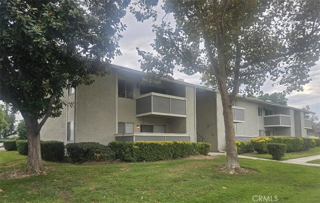 Beautifully Updated Condo in Redlands West: Move-in ready upstairs unit located just steps from the community pool and tennis courts. This stylish home features a newly remodeled kitchen with modern cabinets, quartz countertops, and updated lighting. The dining area flows seamlessly into the living room and out to a private upstairs patio deck—perfect for relaxing or entertaining. Inside, you’ll find fresh interior paint throughout and easy-care tile flooring in the main living areas. The spacious bedroom offers a walk-in closet, and the updated bathroom includes a tile floor and shower-over-tub combination. Enjoy the convenience of being close to shopping, dining, and the I-10 Freeway. Citrus Trails Park is across the street with children's play area-basketball hoops-pickleball courts-dog park-walking trails-picnic/BBQ areas and so much more. The VA Ambulatory Care Center is within walking distance, and Loma Linda University Medical Center is just minutes away. This condo combines modern updates, a great location, and community amenities—ready for its new owner!