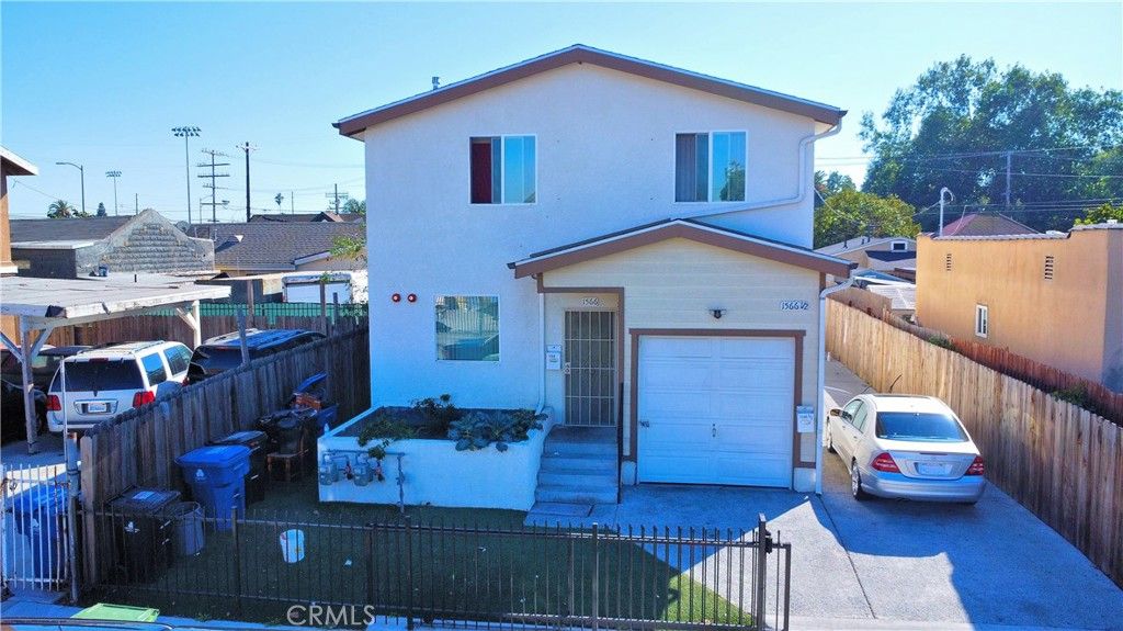 Photo of 1566 E 106th Street E, Los Angeles, CA 90002 (MLS # CV25260577)
