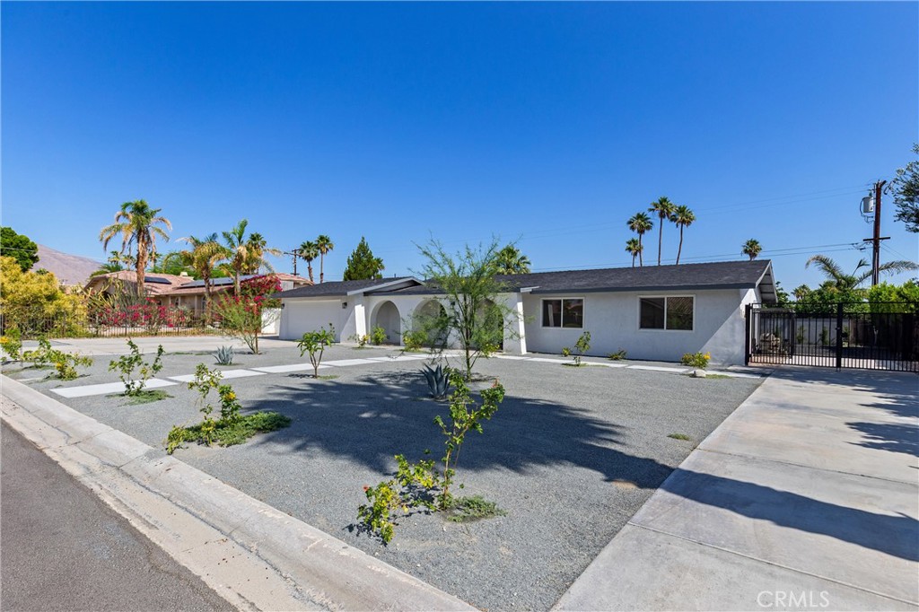 Introducing an incredible opportunity at 2852 E San Angelo, Palm Springs! This charming residence features 3 spacious bedrooms and 2 full baths, perfect for families or guests. Enjoy substantial RV parking on both sides of the property, making it ideal for outdoor enthusiasts. The stunning views of the San Jacinto Mountains provide a picturesque backdrop, while being conveniently located near downtown Palm Springs. Relax and entertain in the beautiful pool area, complete with a patio and a large yard that offers plenty of space for gatherings and outdoor activities. Don't miss your chance to own this slice of paradise!