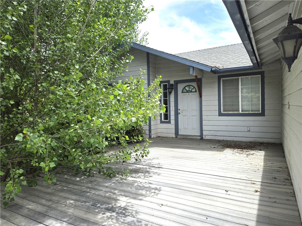 Gated Community. Privacy, tucked away from the road behind mature trees and a long driveway. Welcome to your farm. Over 1 acre of beautiful property with a good home. Three animal stalls, pasture, and outbuildings. Home has great potential with a little TLC. Large deck for entertaining opening out to unlimited views. A diamond in the rough, imagine what you can do with this home. This is an opportunity not to be missed.