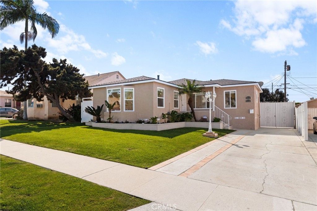 Photo of 2046 W 112th St, Los Angeles, CA 90047 (MLS # CV26054412)