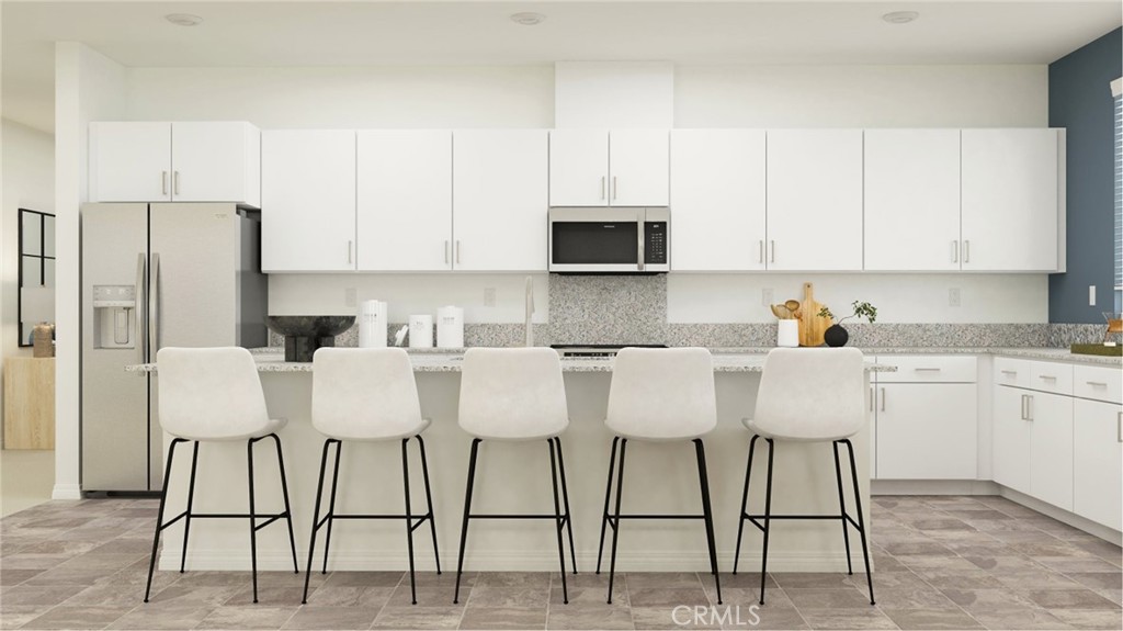 NEW CONSTRUCTION! Ready for Immediate Move-in!This new single-level home features a modern and low-maintenance layout. An open-concept floorplan combines the kitchen, dining room and Great Room for seamless entertaining and multitasking. Three bedrooms are tucked to the side of the home, including the luxe owner’s suite in a private rear corner, complete with a spa-inspired bathroom and walk-in closet.
The kitchen features new caledonia granite counters and white cabinetry.
Silverstone is a brand-new collection bringing new single-family homes to the Green Valley Ranch masterplan, now selling in Perris, CA. Residents will enjoy access to fantastic onsite amenities and spacious, two-story home designs. Local attractions including Lake Perris, the Railway Museum and the Perris Speedway offer ample recreation and entertainment options. Proximity to the 215 and 74 freeways helps to simplify everyday commutes and travel, and the community is serviced by schools in the Romoland and Perris Unified School Districts.