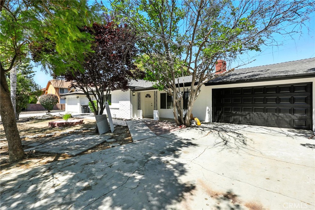 Beautifully Remodeled Home with ADU Potential – Move-In Ready! Welcome to this stunningly remodeled 3-bedroom, 2-bathroom home with an office/flex room nestled in a desirable Hemet neighborhood. Set on a generous 6,100 sq ft lot with no HOA, this home is the perfect blend of modern upgrades and timeless comfort. Step inside to an open-concept layout ideal for both everyday living and entertaining. The chef’s kitchen features sleek countertops, custom cabinetry, and premium appliances, all designed with style and function in mind. The living area seamlessly connects to the kitchen and dining space, anchored by a cozy fireplace that adds warmth and character. Enjoy peace of mind with a long list of upgrades, including a brand-new roof, plumbing, central AC and heating, energy-efficient windows, recessed lighting, fresh interior and exterior paint, garage door and luxury flooring throughout. Both bathrooms have been elegantly upgraded with high-end finishes. The professionally landscaped front yard and spacious driveway enhance the home’s curb appeal. A standout feature is the room behind the garage with its own separate side-yard entry—ideal for a ADU conversion. With the addition of a separate restroom, this space could significantly boost property value and generate an additional rental income of approximately $700 to $1,500/month, making it a great opportunity for homeowners and investors alike. Located close to shopping centers, major freeways, and schools, this move-in-ready home offers the perfect combination of comfort, convenience, and investment potential. Don’t miss out—schedule your private tour today!