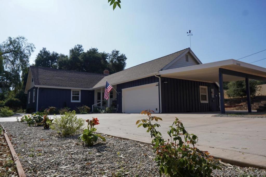Move in Ready!!! Fully Updated. This gorgeous home sits on 3/4 of an acre and has been completely renovated inside & out. New concrete driveway, walk ways, ac & heating, landscaping, sprinklers, covered parking, dual pane windows, paint, appliances, quartzite counter tops, washers & dryers, bathrooms, vanities, newer roof, and more. The attic area has been fully remodeled to add an extra bedroom & bathroom. The garage has been fully insulated, dry walled, new lighting, 2 electric vehicle hookups, and comes with new dog wash, & dual wash machines & dryers. The yard feels like a park with lots of new grass and has a big beautiful oak tree for shade- perfect for parties or weddings. There's a new garden area just outside the patio area. This house has it all. Great investment opportunity with subdivision / SB9 options and ADU options. Come & see it today. It won't last long. Make your dreams come true.