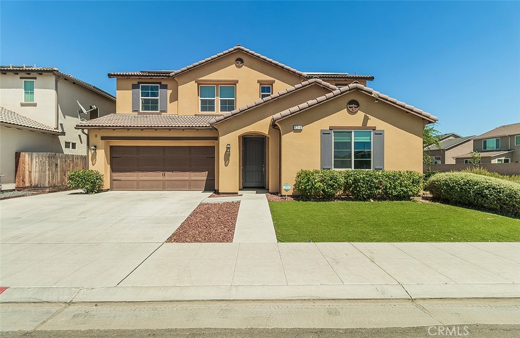Welcome to 4210 N Rosalie Avenue, this spacious 5-bedroom, 3.5 bath residence offers a perfect blend of comfort and serene natural beauty. As you enter, you'll be greeted by a spacious open-concept living area flooded with lots of natural light. This model has the extended living room, aka super great room, which is great for indoor entertainment or family gatherings. The first floor is all tiled with a gourmet kitchen with a huge island and walk-in pantry. There’s an enormous Mother-in-law suite with a private bathroom and its own living room downstairs, in addition to a half bath also located downstairs for Guess. The upstairs loft is great for a remote office or entertainment. The laundry room is conveniently located upstairs. The ginormous primary suite provides space for privacy and relaxation with an ensuite bath and jetted tub. Three additional bedrooms provide plenty of space for family or guests, with convenient access to well-appointed bathrooms. The low-maintenance backyard setting is so peaceful, you are sure to enjoy alone time or entertaining with friends and family. There are many other upgraded features, such as PAID OFF SOLAR PANELS, cement and artificial grass backyard surrounded by a privacy wall, water softening system for the whole house, and alkaline drinking water system under kitchen sink, pre-wired camera security system, and Wi-Fi extender. This home is located in a desirable neighborhood, easy access to local parks, places of worship, supermarkets, shopping centers, and many other local amenities. This is a must-see to appreciate.