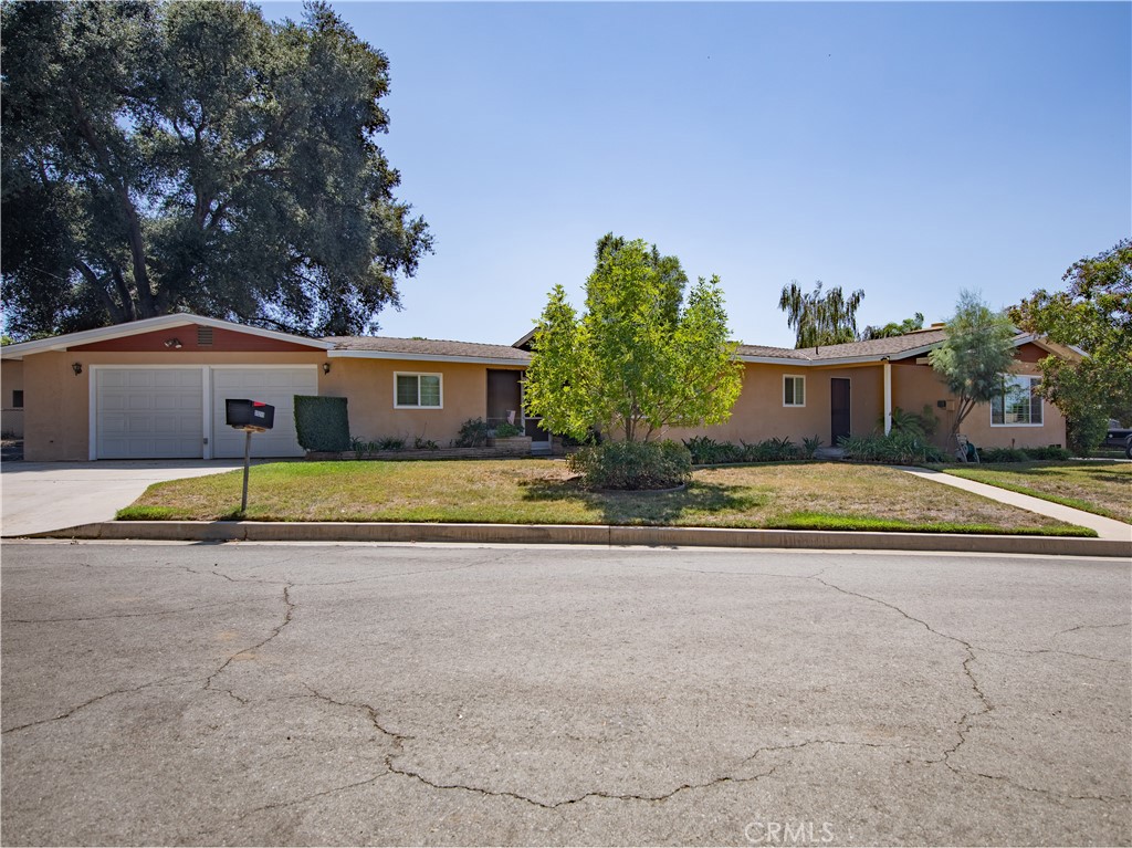 Graced by majestic Oaks, this mid-Century ranch style home provides so many wonderful features. Located at the end of a cul-de-sac, the setting is quiet with sparse traffic. An asphalt RV pad adjacent to the garage is approximately 18' x 53'. The two-car garage is oversized in both depth as well as a work area. Indoors, you'll step back in time to a classic floor plan popular in the 60's. Beautifully maintained, the home offers generous storage, a raised hearth surrounding the wood burning fireplace in the living room, newer windows and plantation shutters. Don't miss the classic, colored tile in the baths. Truly, a special home!
Just think of the money you'll save not paying high taxes, HOA fees and RV storage!