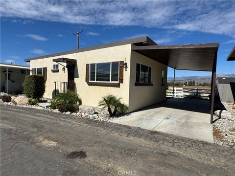 Photo of 1134 Villa Calimesa Lane #63, Calimesa, CA 92320 (MLS # IV26227784)
