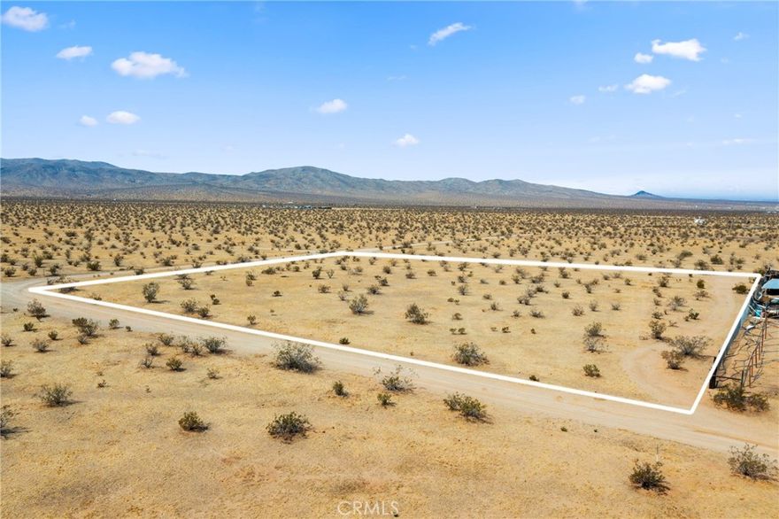 Opportunity is knocking with this prime piece of land—APN#0470-202-09—perfectly situated near an already developed residential area full of charm and convenience. Sitting on a generous 88,426 square feet—just over 2 acres—this flat, build-ready lot offers a blank canvas for your dream home or next investment. Imagine creating something special just minutes from established track homes, local dining spots, and shopping centers—everything you need is right around the corner, yet you still get the space and flexibility to build exactly what you want. Whether you're a developer or someone looking to design the perfect custom home, this is a rare find in a growing area. Don’t miss out on the potential waiting here!