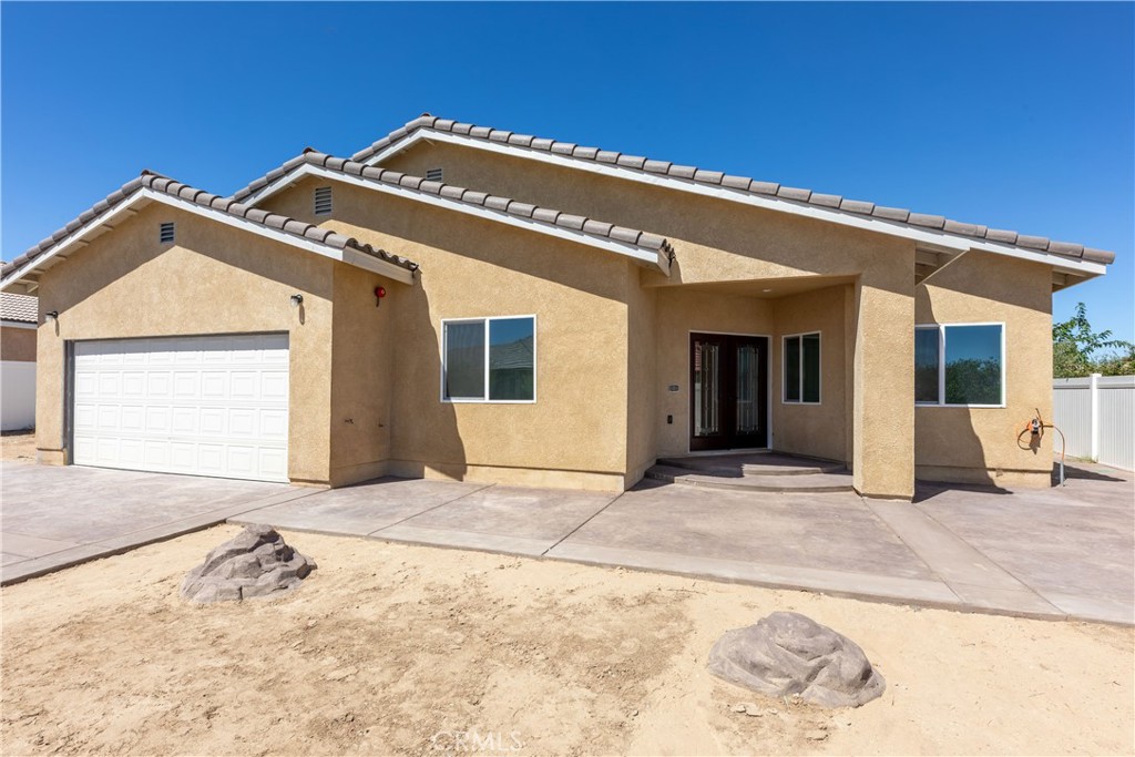 **Spacious New Construction Home in Silver Lakes, Helendale** Welcome to this beautifully designed 4-bedroom, 3-bathroom new construction home nestled in the scenic Silver Lakes Association community of Helendale—a hidden gem known for its breathtaking desert landscapes, resort-style amenities, and welcoming atmosphere. This turnkey property offers 2,291 sq ft of modern living space on a generous 11,360 sq ft lot, combining functionality, style, and room to grow. The open-concept layout is perfect for entertaining and everyday living, while the 440 sq ft covered patio extends your space outdoors for seamless indoor-outdoor enjoyment. Key Features: 4 spacious bedrooms & 3 bathrooms... 2,291 sq ft of thoughtfully designed living space...Expansive 11,360 sq ft lot...Open layout with abundant natural light..2-car garage..OWNED solar panels for energy efficiency...440 sq ft patio ideal for entertaining or relaxing outdoors...Turnkey condition – move in and enjoy immediately. Located within the Silver Lakes Association, residents enjoy exclusive access to: golf course, 2 private lakes for boating and fishing, Clubhouse, swimming pool, fitness center, tennis courts, Equestrian center and RV parking and so much more. Whether you're seeking a full-time residence or a weekend escape, this home offers the perfect balance of comfort, space, and community in one of the High Desert’s most desirable neighborhoods.