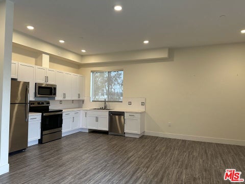 Photo of 11115 Mccormick Street #401, North Hollywood, CA 91601 (MLS # 26864569)