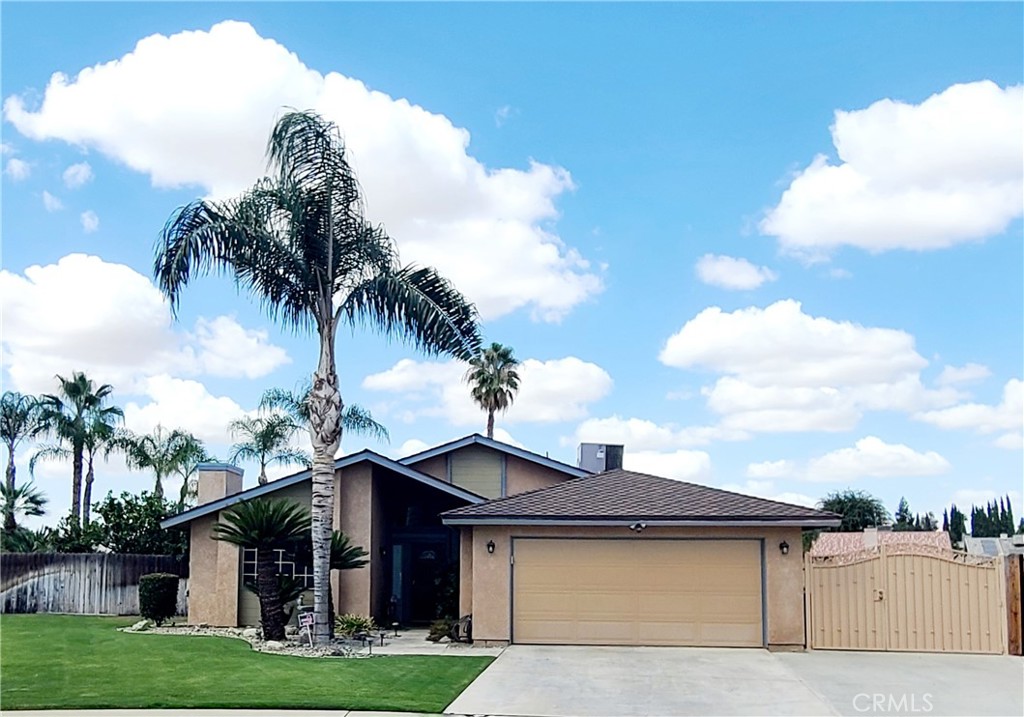 Looking for a private Oasis? Look no further, this property checks off all of your boxes! Cul-de-sac lot over 13000 square feet. Extra large RV/Concrete area behind the beautiful custom wrought iron gate and more RV parking outside the gate in front. There is a huge covered patio for entertaining with french doors opening from the dining room. The patio overlooks the incredible rock waterfall that cascades into the swimming pool. Majestic palms surround the pool area and behind the pool is a separate garden area. Big grass area for outside games and several citrus trees complete this incredible backyard. Newer items include: Roof has a 50 year dimensional,hot water heater and smart pool pump. Primary suite has french doors leading to a relaxing spa on the patio. Need 4 bedrooms? The 2 car garage is permitted/vented and finished, endless possibilities