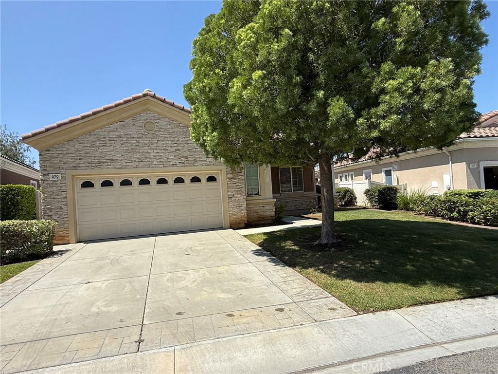 Ready to downsize? Imagine resort living every day! Beautiful 2 bedroom 2 bathroom plus den home in the desirable 55+ gated Solera Community. Tile and carpet flooring, kitchen is open to the family room with fire place. Primary bedroom has an en suite bathroom with dual sinks, separate soaking tub and walk-in shower, and spacious walk-in closed. Additional room perfect for an office or den. Indoor laundry room, backyard with covered patio, two-car garage. Enjoy a carefree retirement lifestyle with many HOA amenities, including a pool, spa, gym/fitness center, clubhouse, indoor walking track, tennis courts, pool tables and more! Close to Cabazon Premium Outlets, Palm Springs, shopping, and dining.