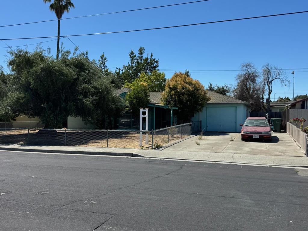 Unlock the potential of this spacious fixer-upper located in a highly sought-after Santa Clara neighborhood. Well situated on a generous 9,694 sq ft lot, this single-level home offers 1,518 sq ft of interior space, featuring 3 bedrooms and 1 bathroom, an ideal place to begin your dream renovation or custom build. Whether you're envisioning a full remodel, a thoughtful expansion, or creating a brand-new residence complete with a backyard oasis, this property presents the rare opportunity to possibly transform a prime lot into a personalized masterpiece. The expansive outdoor space offers endless possibilities for entertaining, gardening, or even adding an ADU (Accessory Dwelling Unit). Perfectly positioned near major tech campuses, acclaimed schools, and everyday conveniences, this home blends unbeatable location, substantial square footage, and endless possibilities, a truly exceptional offering in the heart of Silicon Valley.