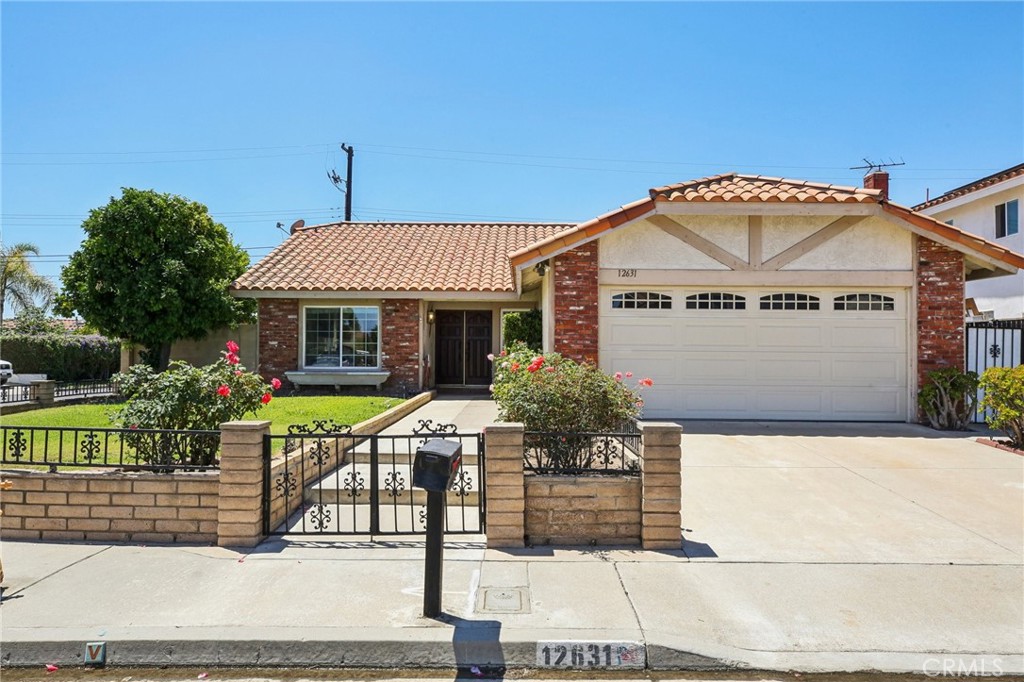 Charming Single-Level Home! This home sits on a desirable corner lot in a sought-after Garden Grove neighborhood surrounded by high-value properties! A large, fully fenced front grassy yard with a citrus tree and extended driveway welcome you home, leading to a two-car garage. Enter through your double doors into a spacious living room with high ceilings and a cozy gas fireplace. The formal dining area features a sliding glass door that opens to the patio—perfect for indoor-outdoor living.
The kitchen flows naturally from the living area, creating an open-concept feel, while the informal dining room at the front of the home boasts a window that fills the space with natural light. All three bedrooms are generously sized. The primary suite includes an en-suite bathroom, walk in closet, and direct access to the sunroom, which leads to your private backyard with a storage shed, a covered patio with a newly replaced roof, and even more citrus—ideal for entertaining or relaxing.
This home also offers solid lath and plaster construction, a durable clay tile roof, and automatic lawn sprinklers for easy maintenance. It's approximately 20–25 years newer than many homes in the surrounding area, offering updated systems and peace of mind. Recent upgrades include a newer garbage disposal (2024), and kitchen appliances—refrigerator, dishwasher, and range/stove—replaced in 2018. The neighborhood has also seen recent improvements with newly repaved streets. Conveniently located close to schools and with no HOA fees, this is not your typical Garden Grove neighborhood—don’t miss your chance to get into this amazing area. Schedule your showing today!