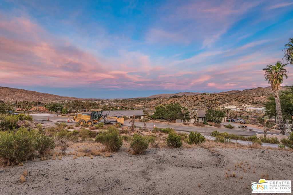 A Stunning 2021 Custom Built Modern Luxury Home In The Country Club Estate... High atop the hill with breathtaking views of city lights & high desert rocky mountains. Home features a spacious master suite, 2 guest rooms, a media room (or 4th bedroom optional), wide hallway & guest bathroom. Architectural design elements, open floor plan, abundant natural lighting &14ft ceiling. Vaulted ceiling in living room & kitchen up to 20ft. A delightful entertainer's kitchen with top of the line stainless appliances including a Z-Line 6-burner professional grade cooktop, custom designed cabinetry, oversized center island & quartz countertops. A large walk-in closet in the master suite with a double vanity, designer tiled shower & a designer stand-alone tub. Expansive French-doors to enjoy the sunrises & city evening lights. Large 3-car garage with 14ft ceiling & 10ft roll-up doors. Potential for vehicle lift to stack cars or ATV's. The home is wired throughout for the best audio, video & internet experience. The solar system is fully owned, offering homeowner's clean, renewable energy & high efficiency living. This beautiful home is perfect for entertaining or just relaxing in luxury whether you're inside or outside taking in the evening stars.