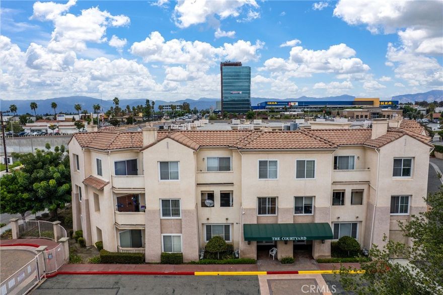 Welcome to the premier 62+ senior living community in the heart of West Covina! This beautifully upgraded and move-in ready condominium offers the perfect balance of comfort, convenience, and sophistication, all within a secure gated complex.

Step inside this inviting 2-bedroom, 2-bath home and experience an open layout designed for both relaxation and entertaining. The spacious living room features a cozy fireplace, while the adjoining dining area and open kitchen create a seamless flow for everyday living. The kitchen is fully equipped with modern appliances—including a refrigerator, stove, microwave, and dishwasher—along with stylish cabinetry and tile countertops.

The primary suite offers true comfort with a private bath, walk-in closet, and sliding glass door leading to your own private balcony. The secondary bedroom also provides generous closet space, making this home as practical as it is elegant. Recent upgrades, including new laminate flooring throughout, updated window shutters, and fresh finishes, give this home a modern touch that’s ready for immediate enjoyment.

Located on the upper level, this bright and airy unit overlooks the community’s beautifully landscaped courtyard with gazebo, BBQ area, and spa—perfect for unwinding outdoors. Residents also enjoy access to a reserved community room for social gatherings, creating an active and friendly environment.Just minutes from shopping, dining, and essential services, this home combines the tranquility of resort-style living with the convenience of city life.? Don’t miss this rare opportunity—condos in this desirable senior community sell fast. Schedule your private showing today and make this exceptional home yours!