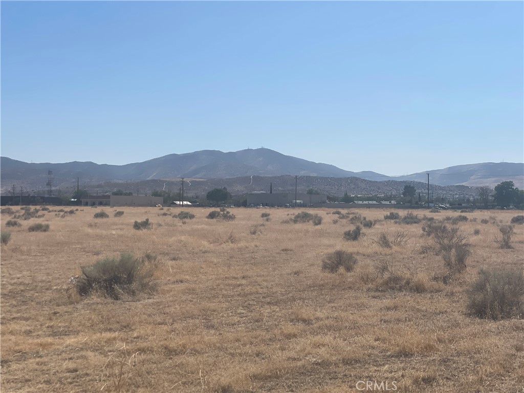 Today's land - tomorrow's investment golden nugget! Undeveloped industrial land located close to Palmdale School District offices. Utilities located at intersection a very short distance (under 1/2 mile). Zoned PDM1; Industrial, could also be used for residential or other. Go see while you can get it at this price!