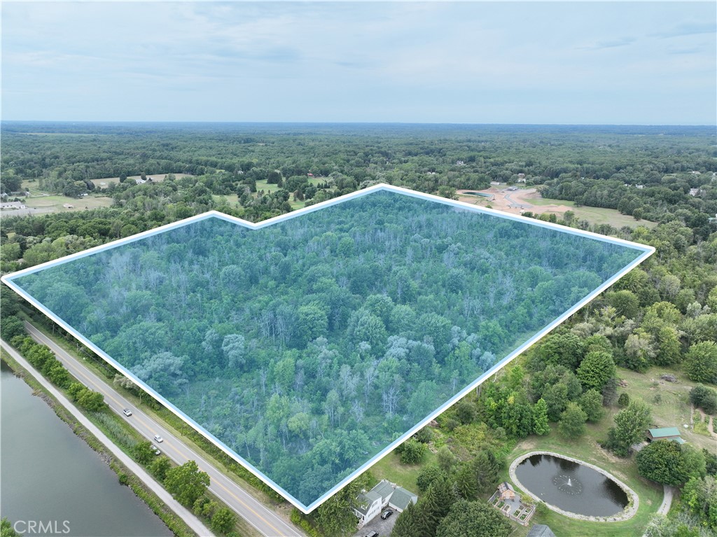 This 53-acre parcel in Spencerport, NY, is perfect for investors, developers, or anyone seeking a large tract of land with endless possibilities. The property has frontage along Canal Rd and a mix of open fields and wooded areas, offering both privacy and potential development options. Whether you’re considering residential development, recreational use, or agricultural pursuits, this lot provides a unique opportunity in a growing area of Monroe County. Located between 3916 and 3838 Canal Rd. - Address is approximate and may or may not be the final address.