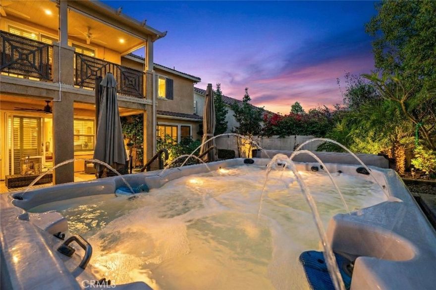 Just Listed! Located in the Prestigious Gated Community of Roripaugh Ranch! This STUNNING Former Model Home with 41 Solar panels(seller will pay off for the right offer) and 3Tesla back up batteries, offers ALL the bells and whistles! Only minutes from Wine Country, Homes in this highly sought-after community rarely become available! If you've been searching for the perfect home, this is it! This beautiful Open Concept home is situated on a rare oversized lot and offers 5 bedrooms (1 on the main floor),4 full baths (1 on the first floor), a powder room on the main floor, a generous 2nd story loft, 4 of the 5 bedrooms are located on the second floor. Upon entrance you'll be greeted by gorgeous custom wood floors that flow throughout the main floor. To the L of entry there is a large bedroom w/ adjacent full bath and a formal dining room (could easily be made into a next gen suite if so desired)! At the back of the house the Huge Super Family room/ Kitchen which features a Large built in and fireplace with upgraded mantle! The Kitchen features Espresso cabinets, Granite counter tops, high end Kitchen Aide appliances, a huge center island, a Beverage center and a large walk-in pantry with custom glass door! Upstairs you'll find 4 addt'l bedrooms including the Primary suite which features a custom barn door & a balcony complete with misters and sunshades.   The huge Spa like Primary bath offers a dual sink vanity, Lg soaking tub, Lg walk-in shower w rain shower head and dual walk-in closets! Every bathroom in this home is upgraded with custom tile and paint. The loft is a great flex space for a playroom, home office, etc.  Upstairs Laundry completes the second floor! The Superior custom appointments have been thoughtfully selected, and no expense has been spared! Upgrades include Custom built-ins, upgraded carpet, upgraded lighting, upgraded base trim and crown molding, custom molding at the entry, custom window coverings, custom glass front door, whole house fan, the list goes on! The Backyard Features a Beautiful Swim spa on a custom pad, a covered patio and artificial turf front and back! We can't imagine a more beautiful Space to Relax and Entertain! Did we mention the taxes are approx 1.2%, including assessments/mello roos! Community Amenities are unsurpassed and include, Club House, Pool, Spa, Sport Court, Tennis Courts, Park, Walking trails and so much more! Amazing schools and conveniently located near frwy, dining & shopping make this home a MUST SEE!