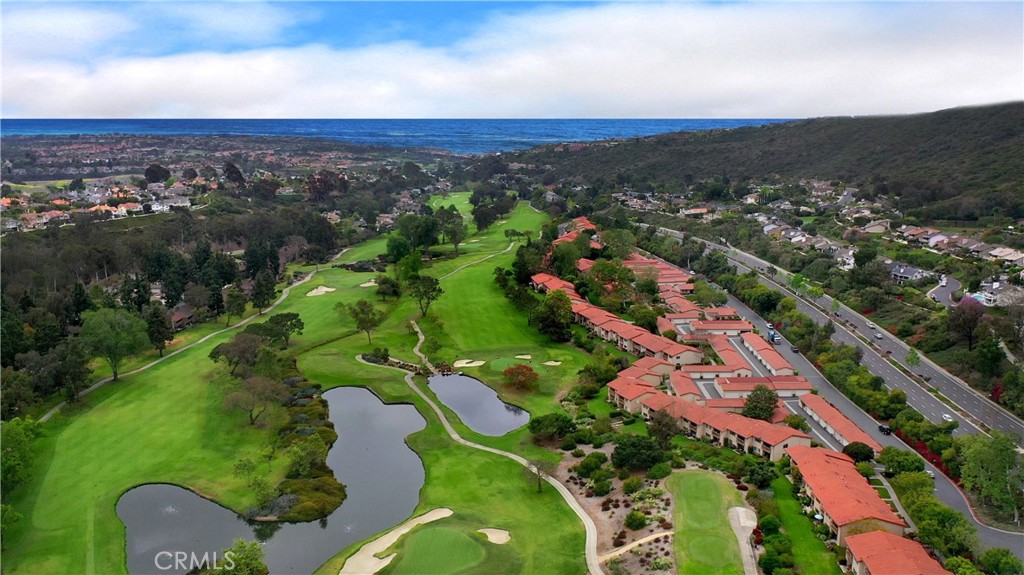 Nestled in the amazing sought after Community of The West Nine this condo is turnkey. Lower end condo boasting three bedrooms & 2 baths has an unbelievable location with amazing golf course views overlooking El Niguel Golf Course....such a tranquil and private setting…ideal for entertaining. Expansive flowing open floor plan ~ offering unbelievable upgrades~ new neutral carpeting, new light fixtures & paint throughout. Master suite on golf course side. Both bathrooms totally remodeled. Modern kitchen boasts new stainless steel appliances, beveled granite counter tops, counter lighting with kitchen island. Graceful style is displayed throughout the interior with warm harmonizing colors. Laundry area located off patio area with new washer & dryer. Large detached 2 car garage with pull down storage... just steps away. Water & trash included in HOA fee. This condo embodies Southern California’s seaside living in the highly sought after Salt Creek Community of Laguna Niguel. Blue Ribbon school district. A must to see! You won’t want to leave home. Enjoy the sophisticated life style of the famed El Niguel Golf Course - think what a beautiful treasure it is to live and breath happiness. Homeowners enjoy a resort lifestyle ....close proximity to El Niguel Country Club, Salt Creek Beach, bike trails, tennis courts, Waldorf Astoria Monarch Beach Resort, Ritz Carlton,Dana Point Harbor, Laguna Beach and shopping. Easy access to freeway & toll road. INCREDIBLE VIEWS. Embrace the gorgeous views from your secluded patio area! Enjoy the vibrant upscale vibe of the West Nine, with a sunny upbeat character.