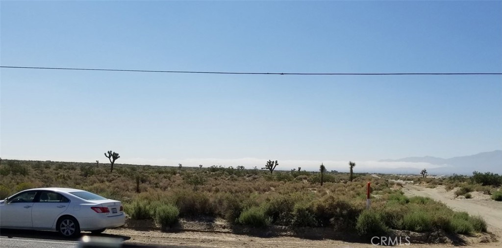 FLAT , PAVED WITH DIRECT ACCESS . UTILITIES NEAR BY GREAT LOCATION FOR SOLAR DEVELOPMENT OR RESIDENTIAL , FARM , RANCH ...