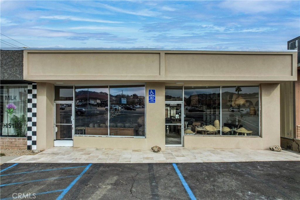 Retail excellence in Yucca Valley, CA! Step into this remarkable commercial building, a retail haven spanning 2,300 square feet of pure opportunity. Boasting two spacious store areas, two bathrooms, and a delightful back patio, this property is a gem waiting to elevate your business aspirations.
Currently occupied by the thriving Yuccasa, this space is a testament to success. Located right off the highway, it enjoys optimal exposure, making it a prime spot for attracting customers. The building has undergone a comprehensive and stylish remodel, from the ground up, ensuring it stands out in perfect condition.
Every detail has been considered in this transformation. New plumbing, back doors, windows, acrylic stucco, and a foam-painted beige roof contribute to the building's fresh, modern aesthetic. The addition of stone floors, specifically travertine, exudes a sense of sophistication and quality. The dual mini-splits AC/heat pumps, 30,000 BTU each, provide comfort in each store, creating an inviting atmosphere for both customers and staff.
The exterior is just as impressive as the interior. The patio area, surrounded by new walls and doors, offers a charming space to relax. The fixed parking pavement ensures a smooth arrival, featuring a designated handicap space among the 10 parking spots available. Security is a top priority with an alarm system and cameras in the back, providing peace of mind for you and your customers.
This retail haven is not just a space; it's an invitation to turn your retail dreams into reality. With its unbeatable location, meticulous renovation, and thoughtful features, this property is a canvas waiting for your entrepreneurial masterpiece. Don't miss the chance to make your mark in Yucca Valley – your retail dream starts here!