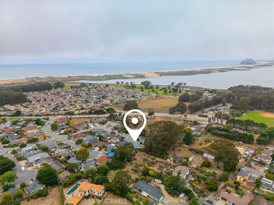 CHARMING LOS OSOS HOME NEAR GOLF, BEACHES AND PARKS!  Nestled at the end of a quiet cul-de-sac in a peaceful neighborhood development, this beautifully updated 3 bedroom 2 bath home offers the best of Central Coast living.  Ideally located just minutes from golf courses, scenic beaches and stunning state parks, this property combines comfort, convenience and natural beauty.  Set on a generous 7,000 sq ft lot, the home boasts a private backyard that backs up to acreage-providing rare privacy and serene views.  Enjoy outdoor living with two spacious patios, perfect for entertaining or relaxing in your own tranquil retreat.   Inside, you'll find a warm and inviting layout featuring a cozy fireplace in the living room and a stylish kitchen with granite countertops, abundant storage cabinetry and easy care laminate flooring.  Many recent upgrades, to include plumbing, roof, central heat and water heater.   Both of the bathrooms have been upgraded and offer modern finishes, including a beautifully remodeled primary bath with a spacious walk in tile shower.  The large primary bedroom includes a sliding closet and the option of an additional walk in closet or office area.  Sliding glass doors open from the primary bedroom to a private covered patio and expansive backyard - ideal for relaxing, entertaining or outdoor living.  This move in ready gem is a rare find in a highly desirable location. Don't miss the opportunity to make this Los Osos retreat your home.