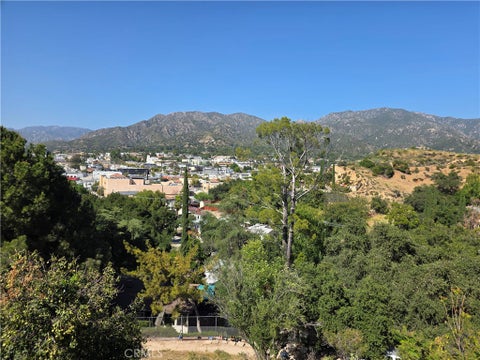 Photo of 9739 Oak Bend Drive, Tujunga, CA 91042 (MLS # GD25156824)