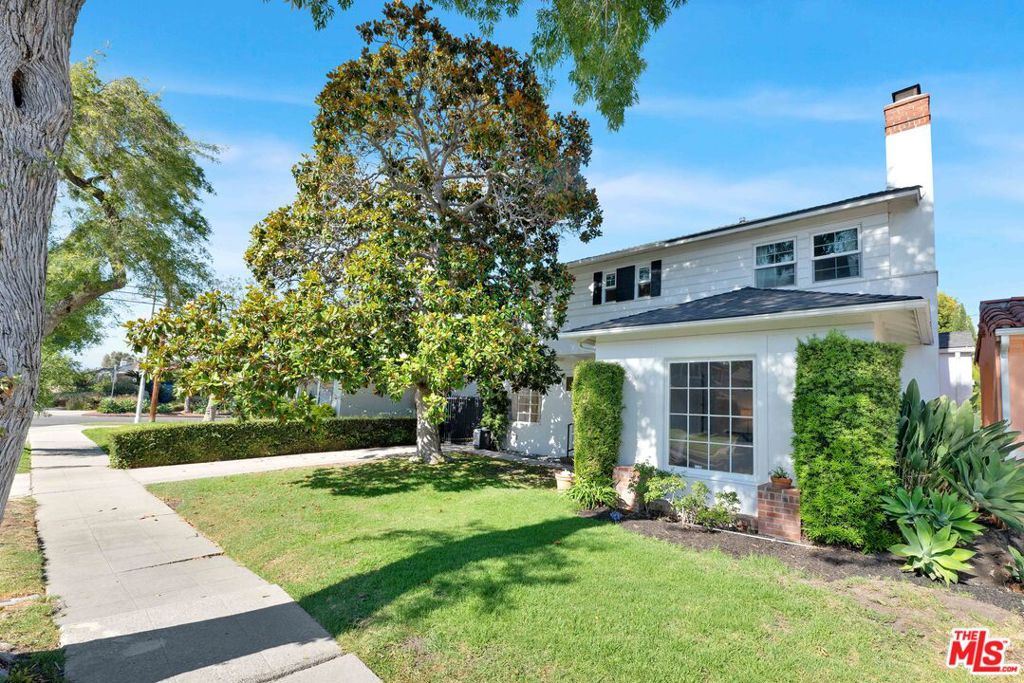 Stately 2-story traditional home on one of Leimert Park's finest streets. The lower level features a classic entry with spiral staircase and step-down living room. The formal dining room is big enough for large dinner parties, while the breakfast room is perfect for the morning tea or coffee. The recently updated kitchen is large for its era, with modern appliances and plenty of cabinet & counter space. The spacious bedroom/office and updated bathroom complete the downstairs space. Upstairs features a large primary suite with cedar walk-in closet and outdoor patio. The second bedroom upstairs is also generously sized. The upstairs bathroom has also been extensively remodeled with a large shower and stand alone tub. Wonderful backyard space with grassy lawn and mature trees, while the large patio offers an additional entertaining space with access to both the dining and living rooms. This home is close to all the shops and amenities that Leimert Park has to offer, and is in close proximity to both the Crenshaw and Expo Lines, offering seamless access to the beach, LAX, and Downtown.