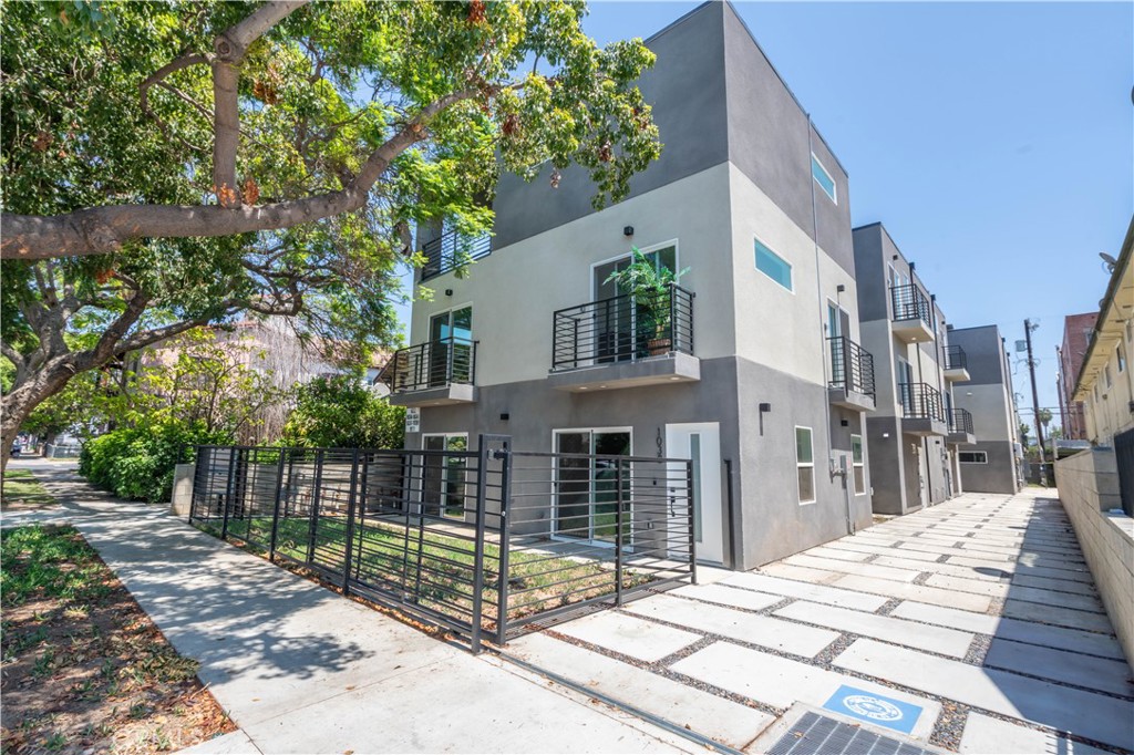 Welcome to 1032 Oxford Ave, located in East Hollywood, CA. This newly constructed development features a combination of one multilevel standalone home, five condo-style apartments, and two additional recreation room conversions (ADUs). Each unit is appointed with premium finishes, including upgraded flooring, specialty tile work, high-quality countertops, stainless steel appliances, soaring ceilings with recessed lighting, in-unit washers and dryers, and private balconies for upper-level residences. The property boasts a Walk Score of 93 out of 100 (per Zillow), classifying it as a "walker’s paradise." Both public transportation accessibility and the Bike Score are also highly rated. Located just minutes from Hollywood, Koreatown, and Downtown Los Angeles, residents have convenient access to countless acclaimed restaurants, bars, and entertainment venues.
Given the building's size and diverse unit mix, leasing and self-management should be straightforward. Furthermore, the strong rental market in East Hollywood continues to offer robust demand, making this an attractive opportunity for property investors seeking stable occupancy and long-term returns.
About Location: Discover the Best of Los Angeles Living: Nestled in a serene residential enclave of East Hollywood, this property enjoys a prime location on the cusp of vibrant Hollywood and the trendy, upscale Los Feliz. Immerse yourself in the heart of LA’s dynamic culture, where world-class dining, entertainment, and cutting-edge commercial opportunities converge. Just steps away from the eclectic flavors of Thai Town, Little Armenia, and Koreatown, this property offers unparalleled access to the city’s most iconic and diverse neighborhoods. Experience the perfect blend of glamour, trendsetting style, and urban convenience.
