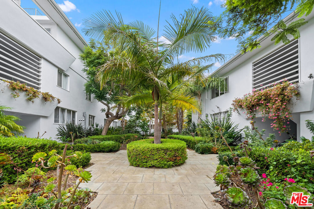 Introducing an exquisite apartment for lease in Santa Monica's most coveted neighborhood, just 300 feet away from Ocean Ave, North of Montana. Discover a coastal oasis nestled within a quiet corner of San Vicente Blvd. This mid-century walk-up building offers a unique, blooming with flowers courtyard, that leads directly to garages and a delightful sun deck area. Immerse yourself in the beauty of this apartment complex with easy access to Palisades Park, breathtaking sunset views, the beach, Montana Ave shopping, and an abundance of fine dining options. Step inside this remarkable 1-bedroom unit and be greeted by its charm. The kitchen features stylish cabinets, complemented by quartz countertops, sleek appliances, and elegant wooden floors. LED lighting illuminates every corner, creating a welcoming ambiance throughout the space. Step out of the kitchen exit door onto the staircase landing balcony that connects you to the backyard with a direct access to garages. Experience the prime location of Santa Monica as you enjoy the beach lifestyle from this idyllic setting. Take leisurely walks to the bluffs and relish in the stunning 180-degree ocean views. Pet-friendly. This unit also comes with one parking spot in a detached shared garage. W/D is in unit. The apartment comes unfurnished, 1 year lease, located on 1st floor. Pet friendly. Broker/Agent does not guarantee accuracy of square footage, lot size, ordinances, zoning, rent control, permits, use code, schools and/or other information concerning the listing.