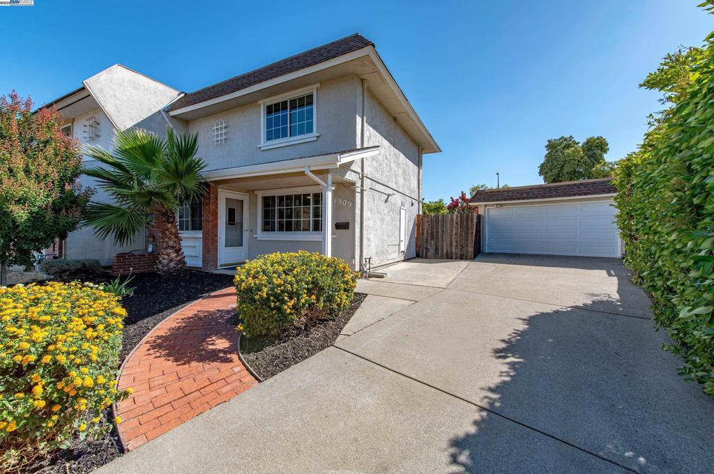 Move-in ready! Walking distance to Downtown and located in the Sunset school area. This well appointed home offers new flooring on the main level, a sparkling kitchen with generous storage and laundry room off the half bath. Upstairs are two bedrooms with new carpeting and a full bath with a new walk-in shower. Yard offers a paver patio, pergola plus a detached garage and full power workshop. Dual pane windows, updated lighting, new garage roof, fresh paint, and so much more. No HOA