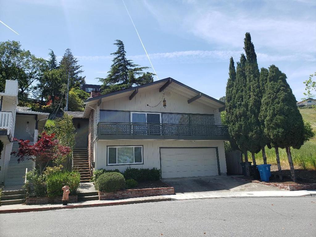 Fantastic spacious home in a top location, view, natural setting, walkable to downtown San Carlos and near top schools. Three bedrooms upstairs with a spacious living room-dining room combination with views. Downstairs includes a large family room and 4th bedroom. Additional wet bar area, 3rd full bathroom and access to the 2-car garage with freezer & Laundry machines. Backyard patio, raised bed and potting shed. 2,980 Gross Bldg SqFt. This home is made to enjoy!