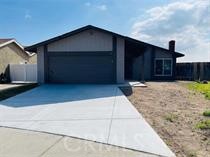 BEAUTIFUL, LIKE NEW, single story home in Moreno Valley with 3 bedrooms, 2 baths, and a 2-car garage. The home has separate living and family room areas, laundry area in the garage, new kitchen and bathroom cabinets with new quartz countertops, new appliances, new interior and exterior paint, new garage door, new LVP flooring in the kitchen and bathrooms, and new carpet throughout the remainder of the home. The front and backyard landscaping has been cleaned to the dirt and is a work in progress. The backyard has a patio just waiting for your patio set and BBQ. This home is walking distance to the neighborhood green-belt/park, close to shopping, restaurants and commuting via the 60 Freeway. A must see!