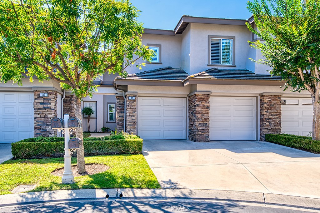 Look no further than this beautifully remodeled home situated within walking distance of the Coto de Caza Golf & Racquet Club! Turnkey with designer finishes, this stunning 3-bedroom + loft, 2.5-bath home offers modern luxury and timeless style. Step inside to find an open-concept floor plan filled with natural light, new wide-plank flooring, and custom details throughout. The brand-new chef’s kitchen features sleek cabinetry, stainless steel appliances, a dining nook, and a peninsula countertop that allows for bar seating. The inviting living room seamlessly connects to the dining area and private backyard patio. Enjoy entertaining or relaxing in the spacious low maintenance backyard while enjoying the stunning Coto Valley views. A downstairs laundry, upgraded half bath, and two-car garage with built-in storage complete the main level. Upstairs, a spacious loft with additional built-in storage provides the perfect flex space for a home office, gym, or play area. The primary suite showcases a beautifully updated spa-inspired bathroom with dual vanities, a walk-in shower, and a generously sized custom closet, plus stunning views from the private balcony! Two secondary bedrooms & a remodeled full bathroom complete the 2nd level. Additional highlights include a whole-house re-pipe, new plumbing in primary bath, fresh paint throughout, and almost all the windows have been replaced. Located near Coto’s scenic trails, parks, golf courses, and equestrian center, 31 Brassie offers the perfect blend of modern comfort and resort-style living behind the gates of one of Orange County’s most coveted communities.