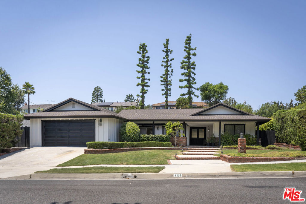 Welcome to 4139 Magna Carta Road - an exceptional opportunity to own a lovingly maintained single story home on one of the most desirable corner lots in Calabasas' Greater Mulwood neighborhood. With a generous, flat 9,682 sq ft lot and incredible proximity to award-winning schools like Chaparral Elementary, A.C. Stelle Middle and Calabasas High, this property offers the rare chance to enjoy a quiet residential lifestyle without sacrificing convenience or access. This spacious home spans 2,401 sq ft and features 5 bedrooms and 2 bathrooms, offering a versatile layout with room to grow. The home has been attentively cared for and thoughtfully updated over the years, providing a strong foundation for new owners to customize or enhance as they see fit. Recent improvements include a roof replacement (approx. 3 years ago), fresh interior and exterior paint (including the fencing), new recessed lighting in the kitchen and bathrooms following the removal of dropped ceilings, and updated flooring throughout. Brand-new carpet has just been installed, and a fully owned solar system - only two years old - adds energy efficiency and long-term value. From its quiet, tree-lined street to its oversized backyard with privacy-enhancing landscaping, this home offers a sense of space and calm that's increasingly rare to find. The floor plan includes both formal and casual living areas, generous bedrooms, and an abundance of natural light, providing a comfortable place to live now with endless potential to elevate and modernize over time. With nearby shopping, parks, hiking trails, and easy access to the 101, it's a location that balances nature, neighborhood, and lifestyle with ease. Opportunities like this don't come around often - especially in a location this desirable, at a price point this compelling. Come see what makes Magna Carta such a special place to call home.