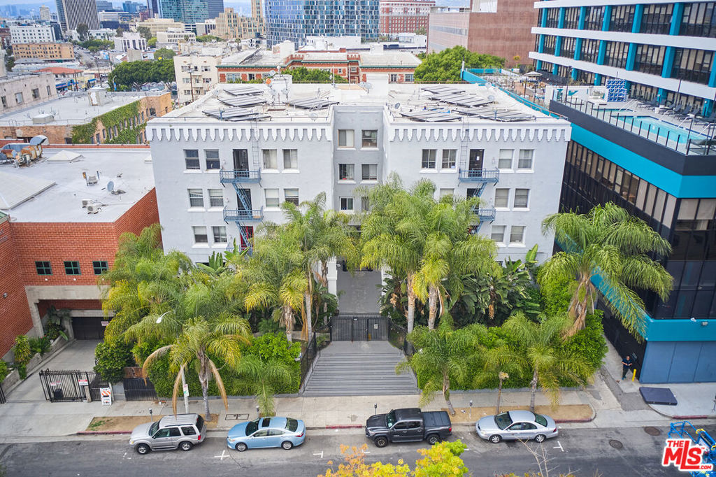 We are pleased to present Chateau Carondelet at 667 S Carondelet St, a 59-unit multi-family investment opportunity in the Westlake neighborhood of Los Angeles located two blocks west of MacArthur Park between Wilshire Blvd & 7th St and just east of Koreatown. The property features a unit mix of 41 singles and 18 one-bedrooms; many units have high ceilings and exposed brick; renovated units include refinished hardwood floors, updated appliances, tile bathrooms, new cabinetry, ceiling fans, and walk-in closets. At the asking price, the property is being offered at a 6.55% CAP rate at 8.80 GRM on current income with an additional 15% rental upside achievable as units turn through continued interior renovations. Enhancements to Chateau Carondelet include professional landscaping and robust security features such as a gated entrance with intercom access and newly installed security cameras. Significant capital expenditures have been made in both the building's infrastructure and communal areas to maintain high standards of living. Additionally, the building is separately metered for electricity, and features a laundry facility that includes three washers and three dryers managed under a lease agreement. High Walk Score of 95, the property is walking distance to the Metro A-E Rail Lines, and Metro Local Lines along Wilshire Blvd & 7th St. This neighborhood of Westlake is ideally located with a short commute to Downtown Los Angeles, Hollywood, and Koreatown. Proximity to MacArthur Park, Echo Park, Dodger Stadium, and The Broad Museum.