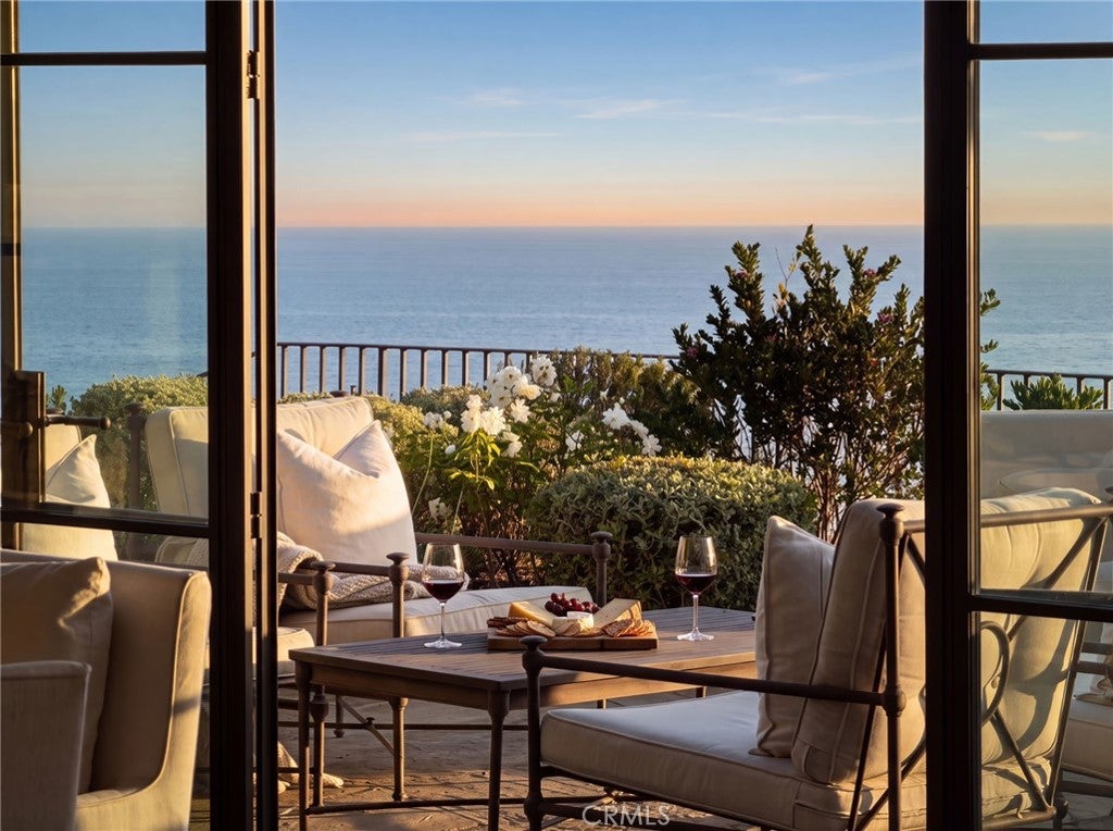 Photo of 425 Panorama Drive, Laguna Beach, CA 92651 (MLS # NP26201637)